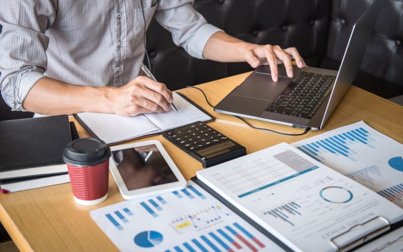 businessman-accountant-working-audit-and-calculating-expense-financial-annual-financial-report.jpg